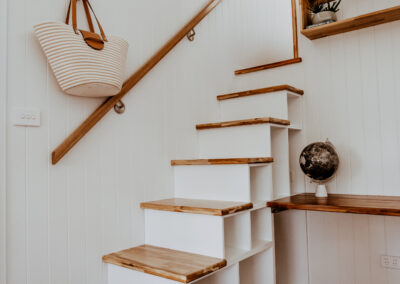 Unplgd. Tiny Homes_ Living Area _Storage Stairs_ Study accommodation